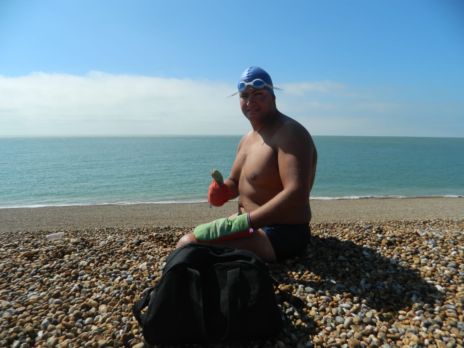 Ahmed Nasef standing on the beach